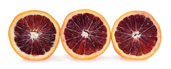 Blood oranges isolated on white background